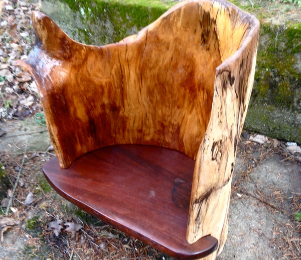 log chair with arm rest" media: shrubbi $1200